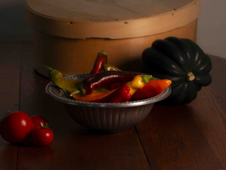 multicolored peppers, green squash and red tomoatoes in pewter bowl, poivrons multicolores, courges vertes et tomates rouges dans un bol en &eacute;tain