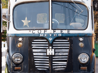 Old black and white Harvester International Truck with coffe shop name, Vieux camion Harvester International en noir et blanc avec le nom d'un caf&eacute;